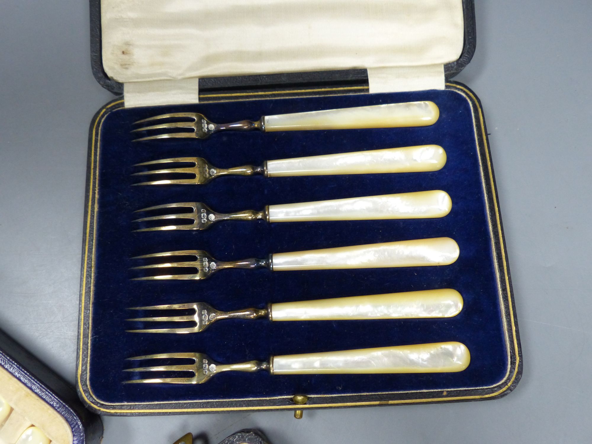 3 x cased silver sets.